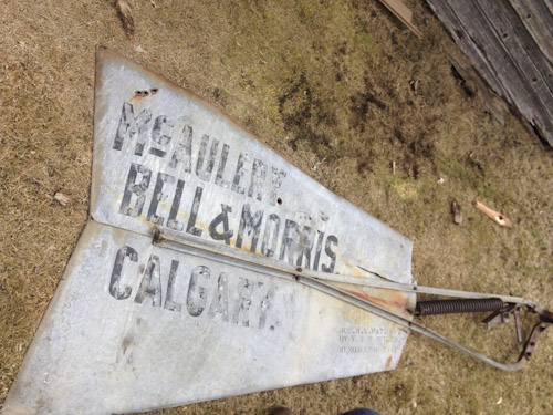 The broken off tail vane of the Springbank Hill wind-pump with the McAuley Bell and Morris stamp.