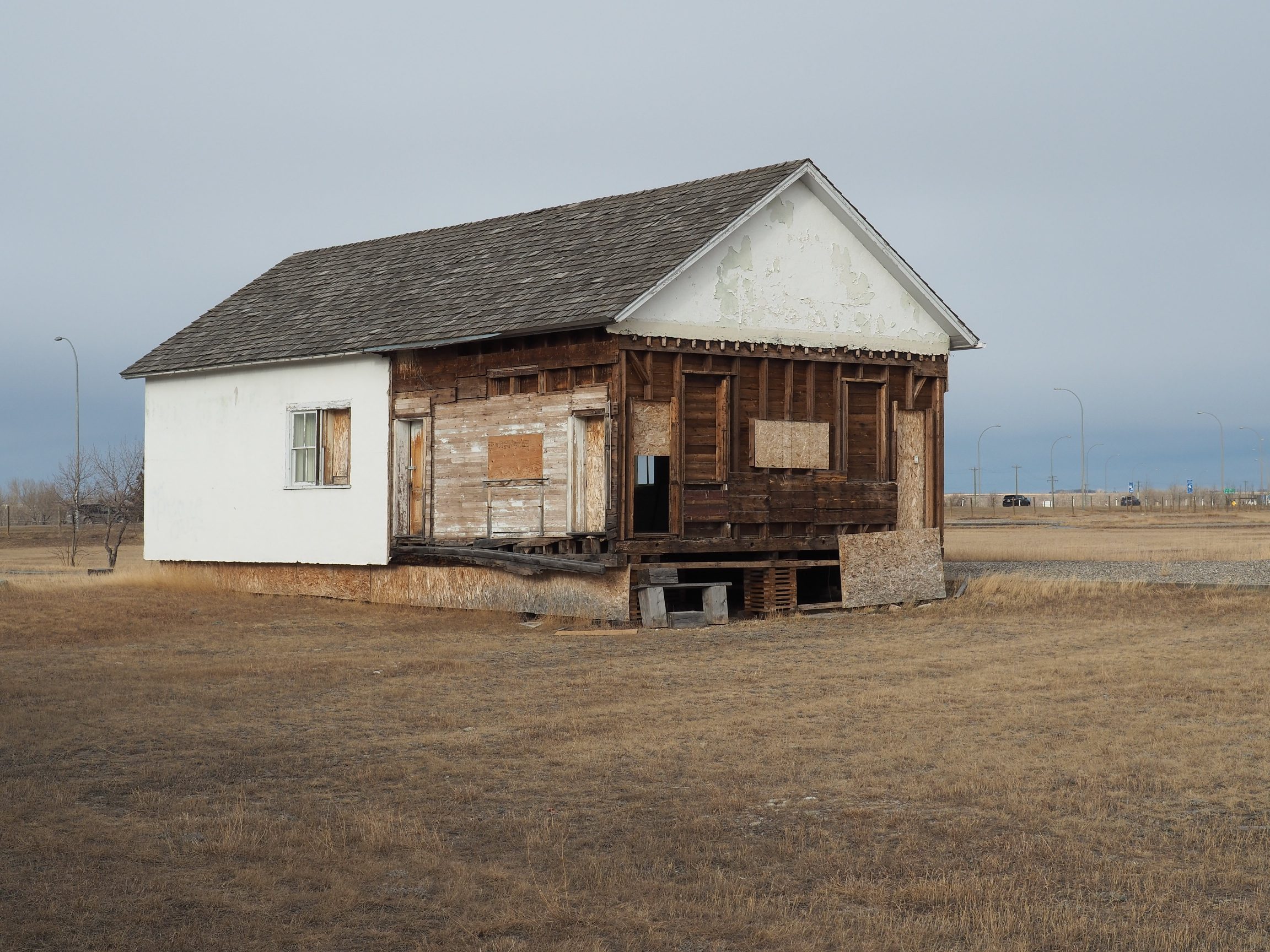 The Harness Shop relocated from the Fort MacLeod town and placed back in it's original location within the North-West Mounted Police Barracks by Alberta Culture and Tourism, 2016.
