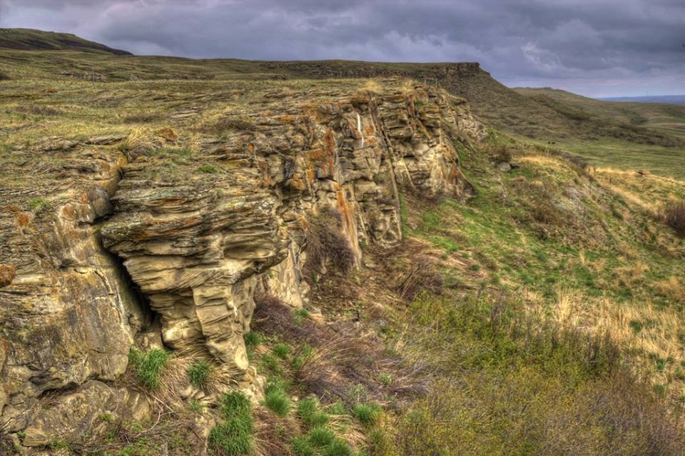 The cliff face that is part of the jump where the buffalo would have been driven over, at Head-Smashed-In Buffalo Jump