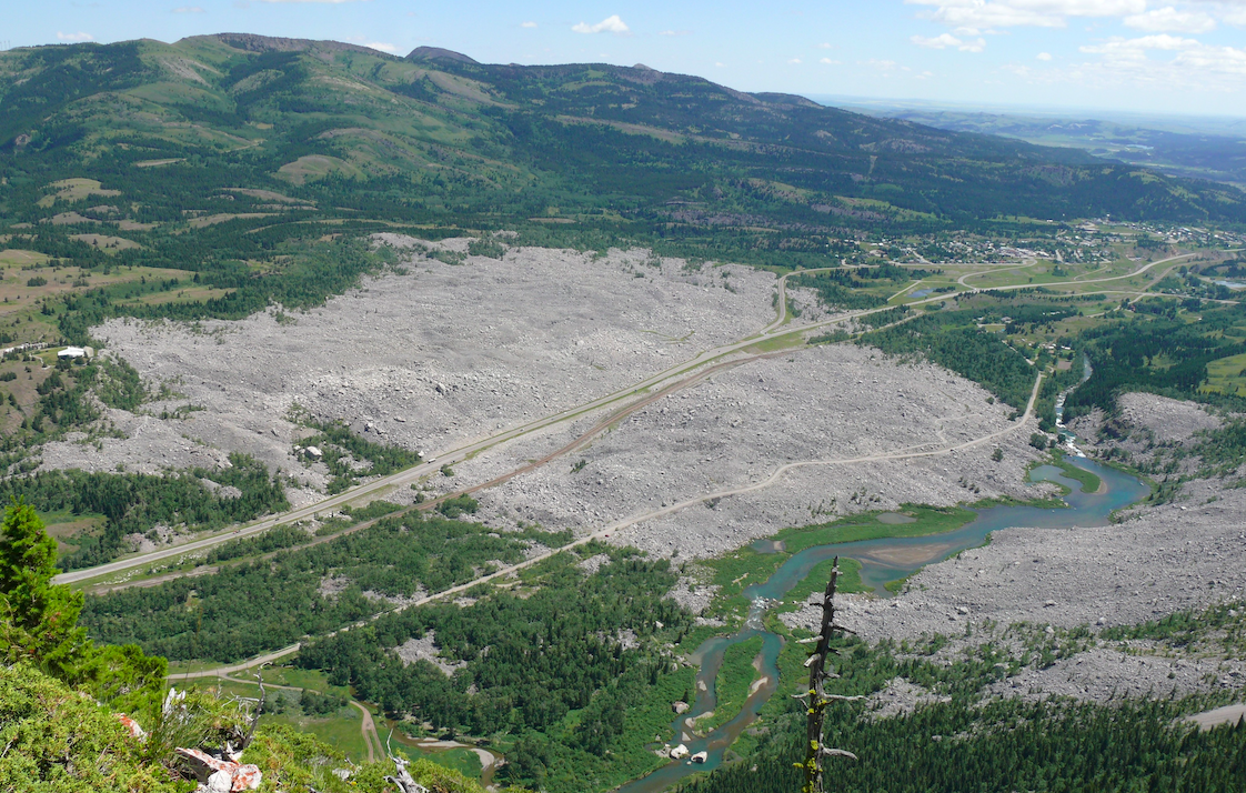 View of Frank Slide from Turtle Mountain. Interpretive centre is visible on the left side. .