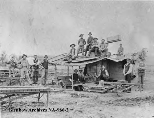 Brickyard workers at a brickyard in Cochrane, Alberta, by J.S. Wilkinson, ca. 1900-1903.