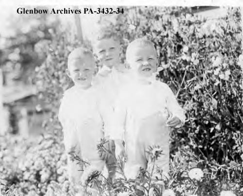 Three Paulin children at Bar U Ranch, Pekisko, Alberta.