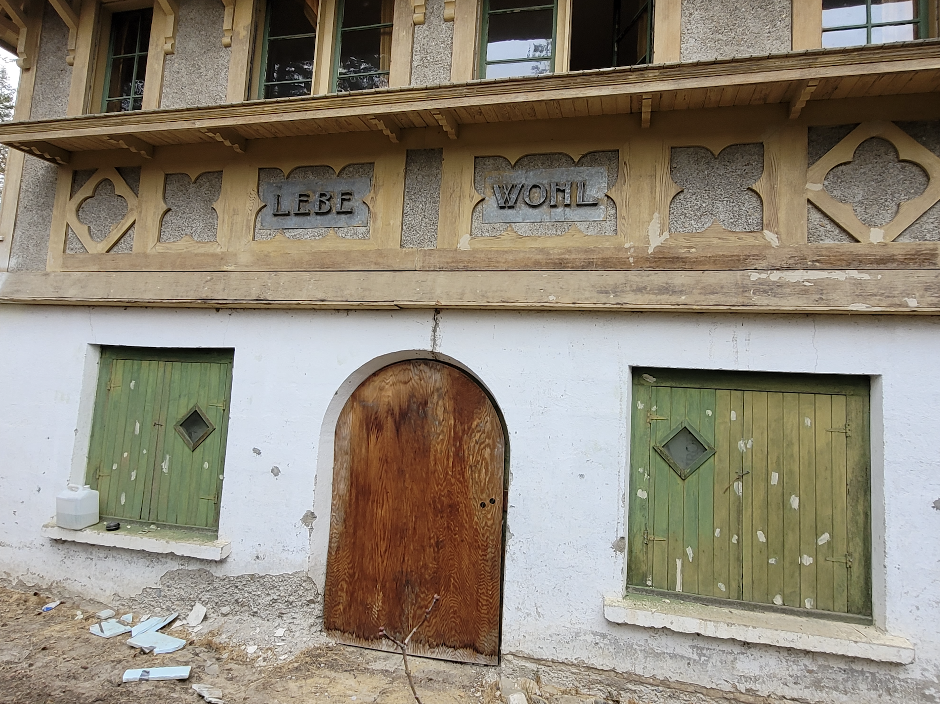 Exterior of rounded basement door of Christian Haesler chalet. During documentation and renovations, October 2023. From Capture2Preserv project.