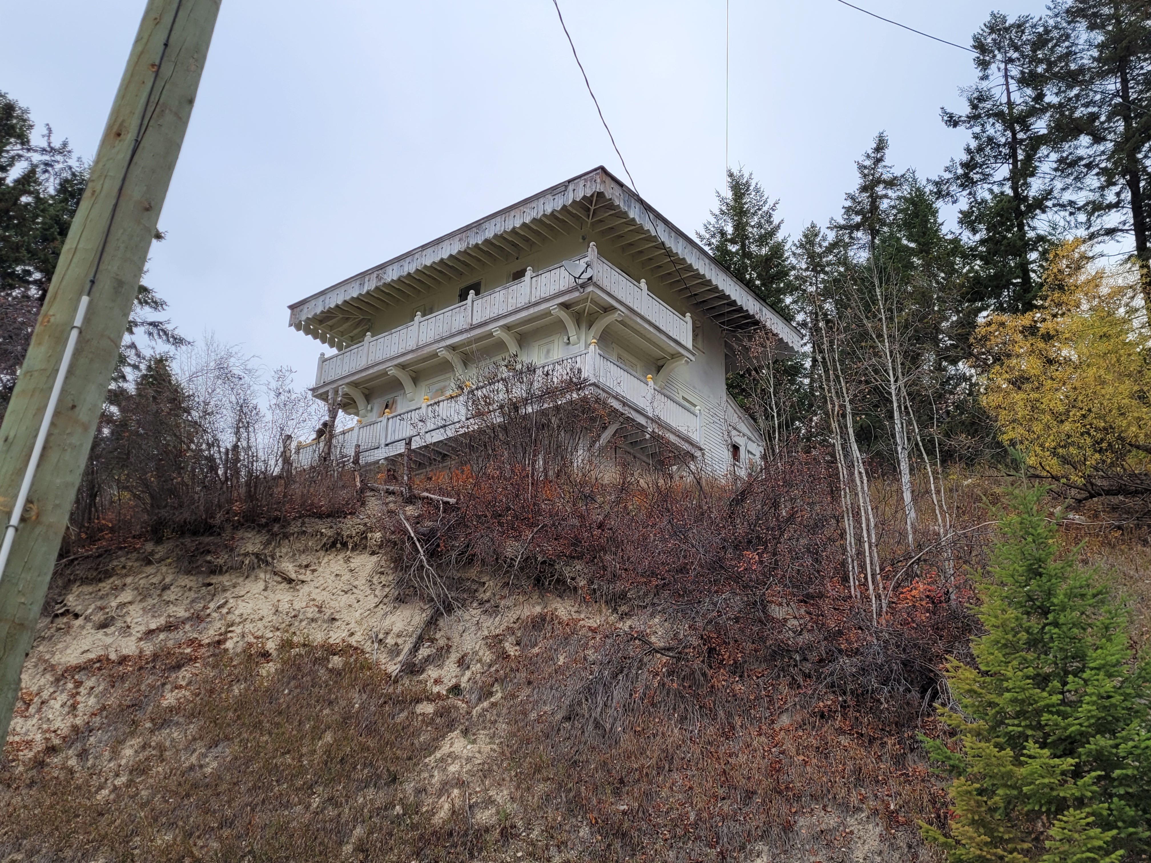 View of the pagoda chalet from road into the Swiss Village. During documentation and renovations in October 2023. From Capture2Preserv project.