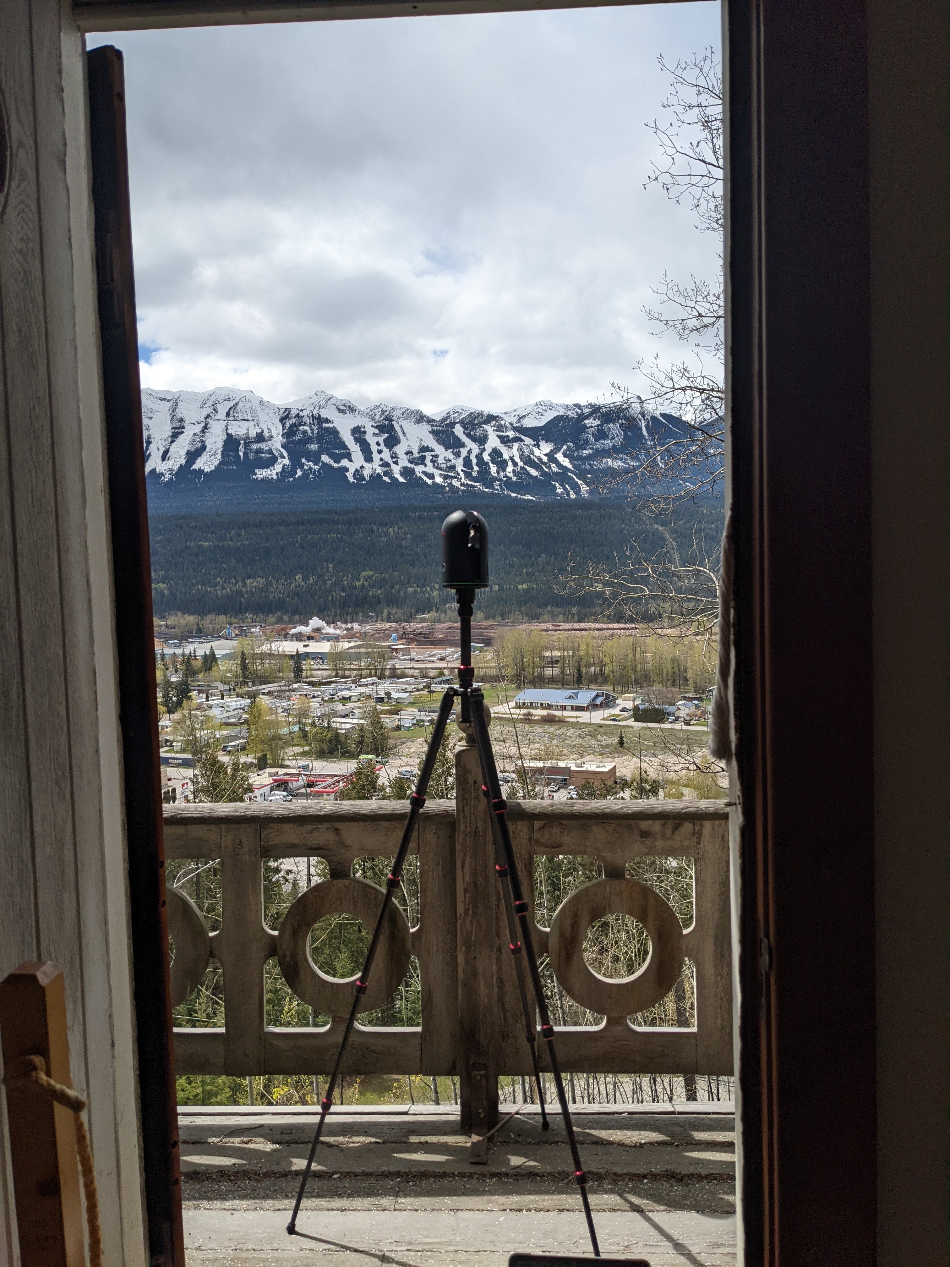 Scanning the balcony of the Edward Feuz chalet with the BLK 360, view of Golden in the background. During documentation in May 2022. From Capture2Preserv project.