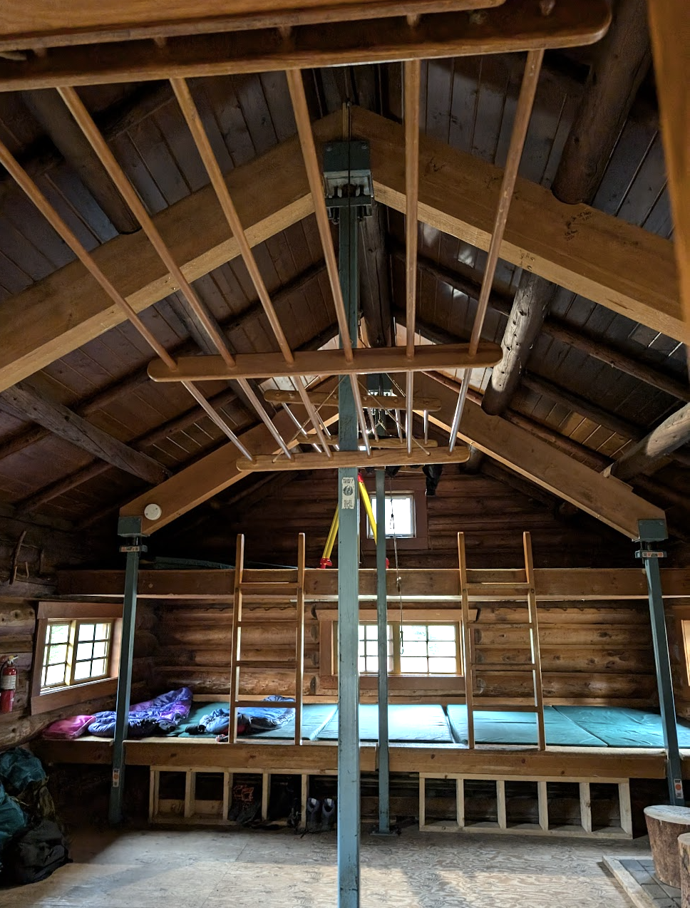 Scanning inside the Elizabeth Parker Hut with the Z+F 5010X scanner set up on the top bunk in the sleeping area. Photo from Capture2Preserv project.